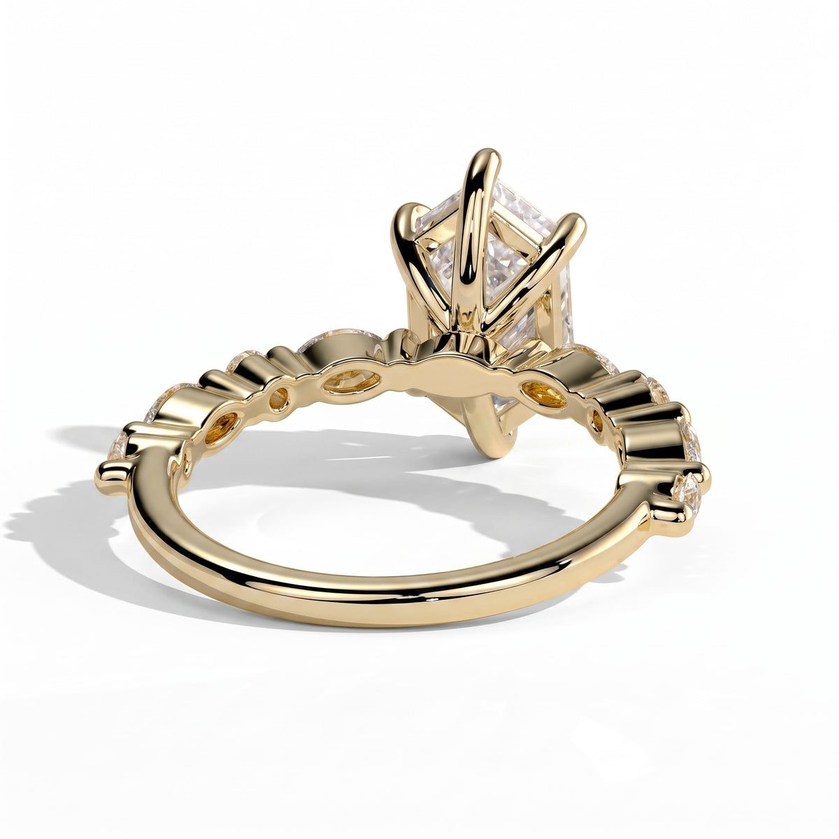 Elongated Hexagon lab-grown diamond halo engagement ring in 14K (585) yellow gold, on white background 