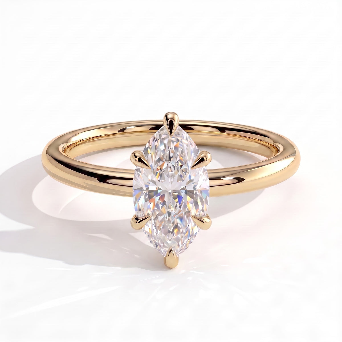 Marquise lab-grown diamond halo engagement ring in 14K (585) yellow gold, front view 