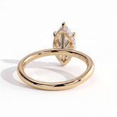 Marquise lab-grown diamond solitaire engagement ring in 14K (585) yellow gold, on white background 