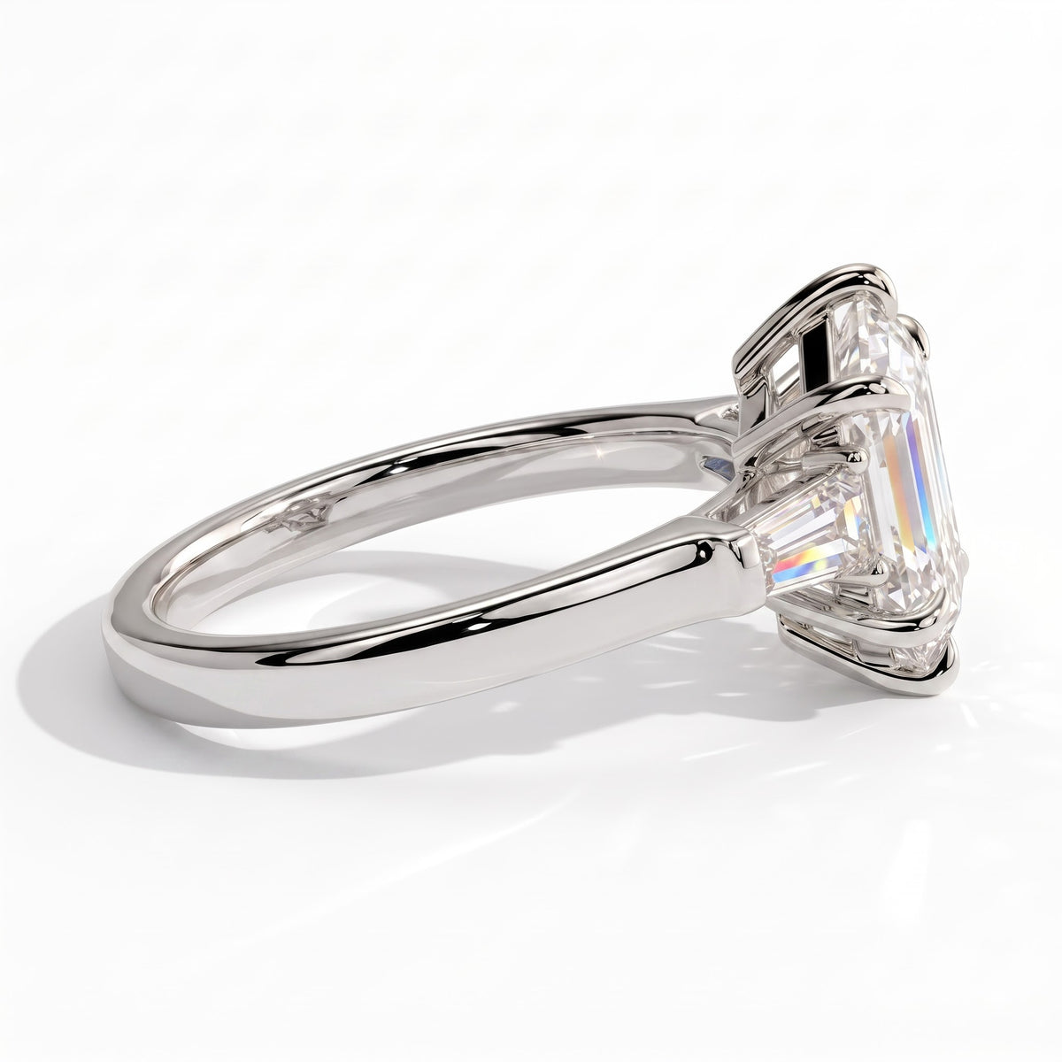 Elongated Hexagon lab-grown diamond three-stone engagement ring in 18K (750) white gold, detail view 