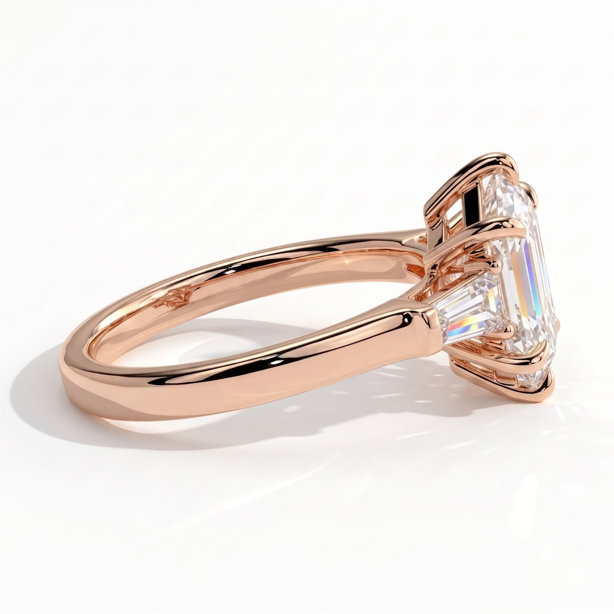 Elongated Hexagon lab-grown diamond three-stone engagement ring in 18K (750) rose gold, detail view 
