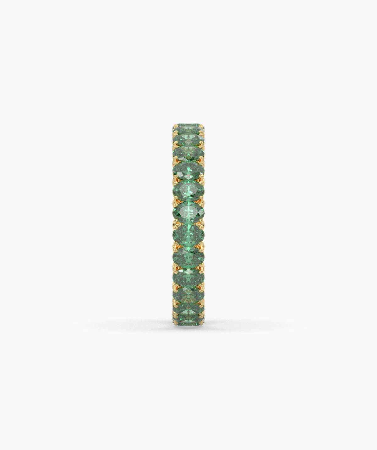 Helene round green gemstone eternity ring in 750 yellow gold, side profile view 