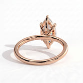 Marquise lab-grown diamond solitaire engagement ring in 18K (750) rose gold, on white background 