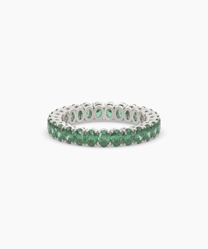 Helene round green gemstone eternity ring in 950 platinum, front view 