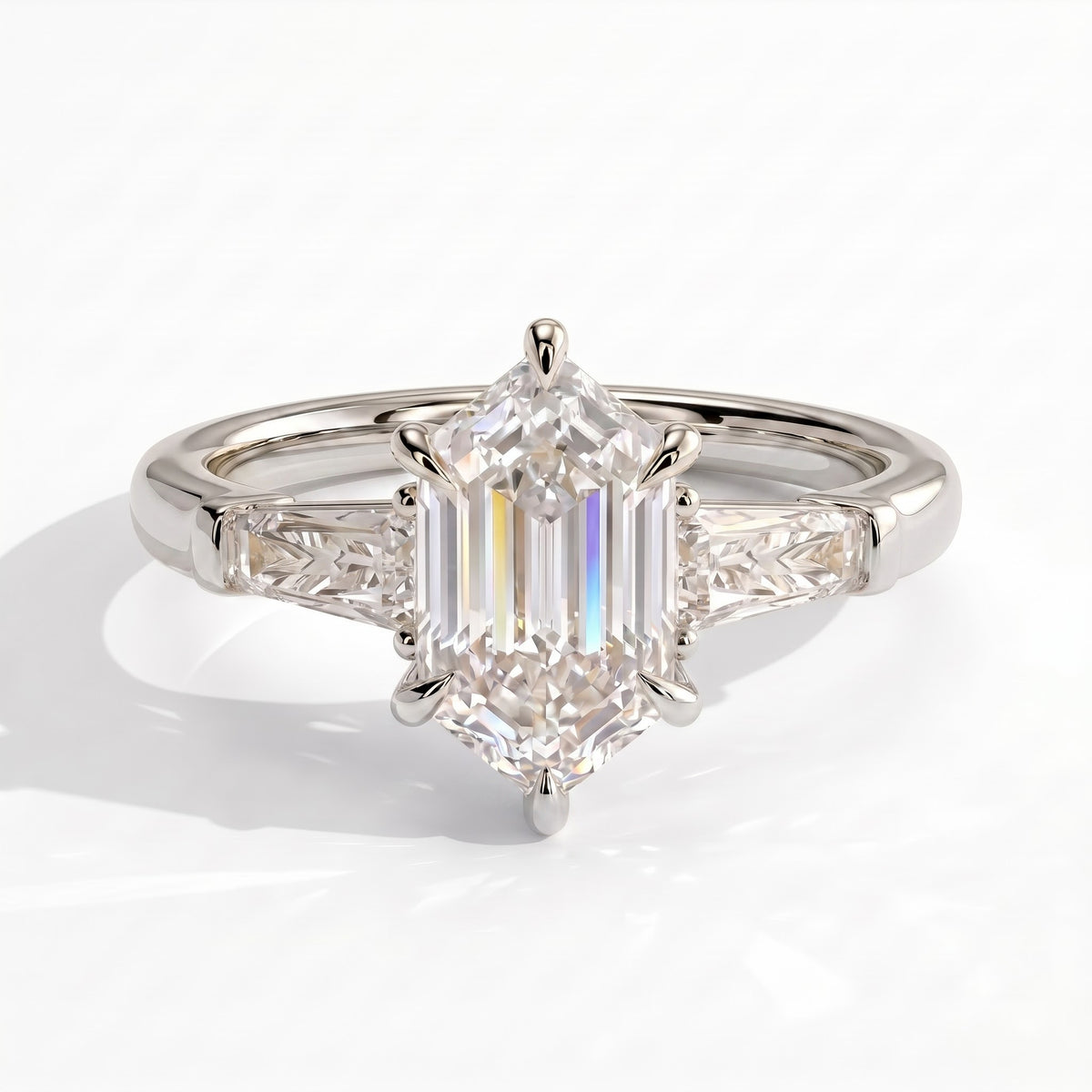 Elongated Hexagon lab-grown diamond three-stone engagement ring in 950 platinum, front view 