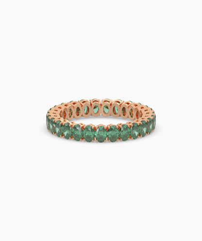 Helene round green gemstone eternity ring in 750 rose gold, front view 
