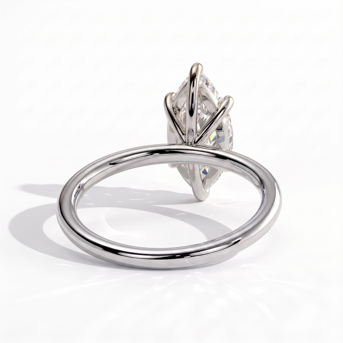 Marquise lab-grown diamond solitaire engagement ring in 950 platinum, on white background 