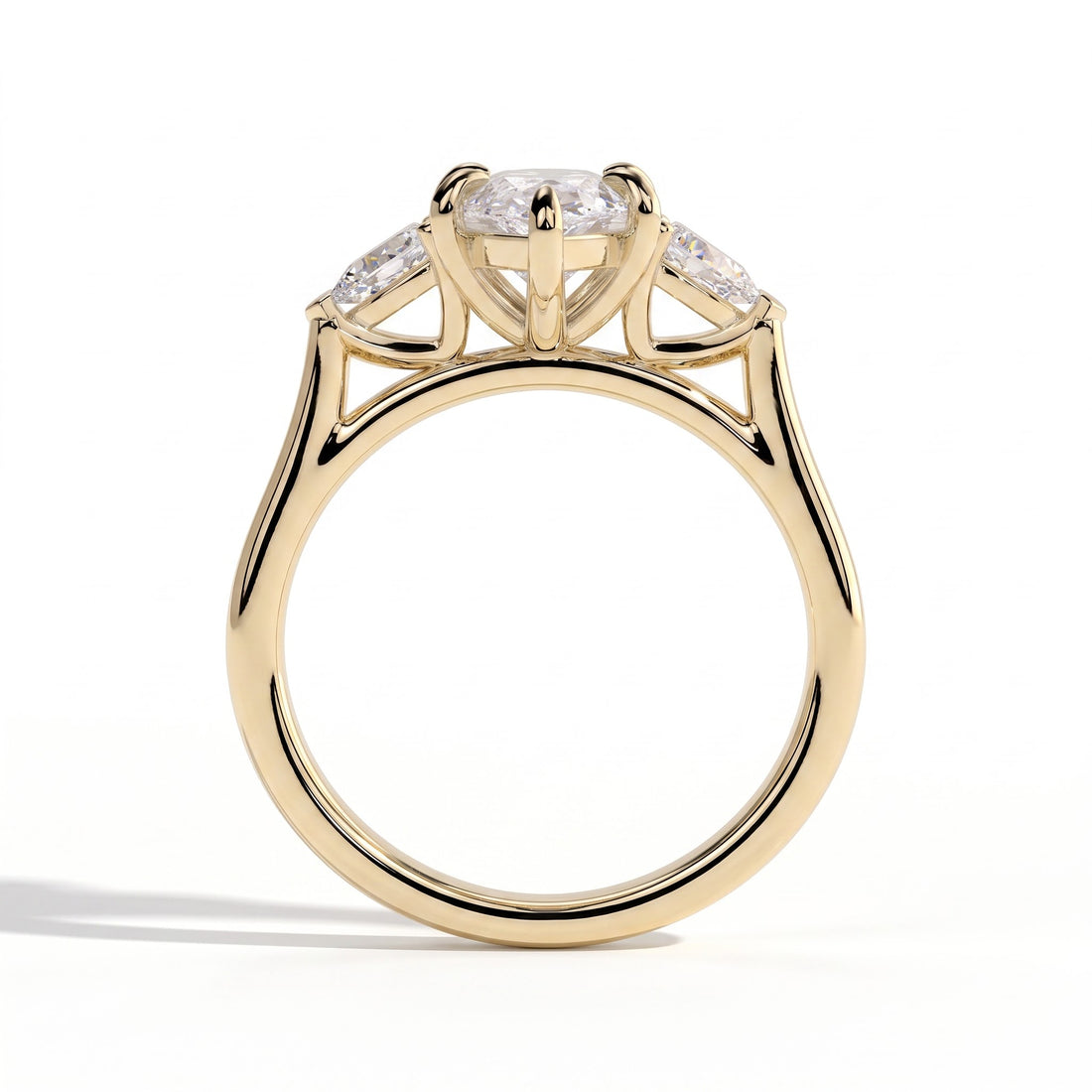 Marquise lab-grown diamond three-stone engagement ring in 14K (585) yellow gold, side profile 