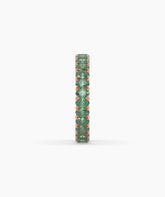 Helene round green gemstone eternity ring in 585 rose gold, side profile view 