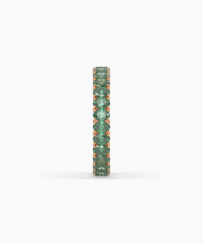 Helene round green gemstone eternity ring in 585 rose gold, side profile view 
