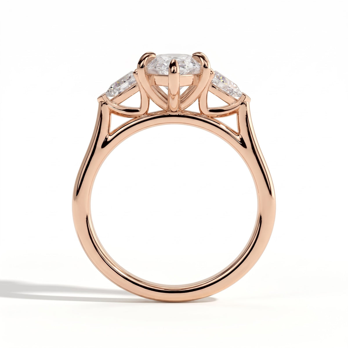 Marquise lab-grown diamond three-stone engagement ring in 14K (585) rose gold, side profile 