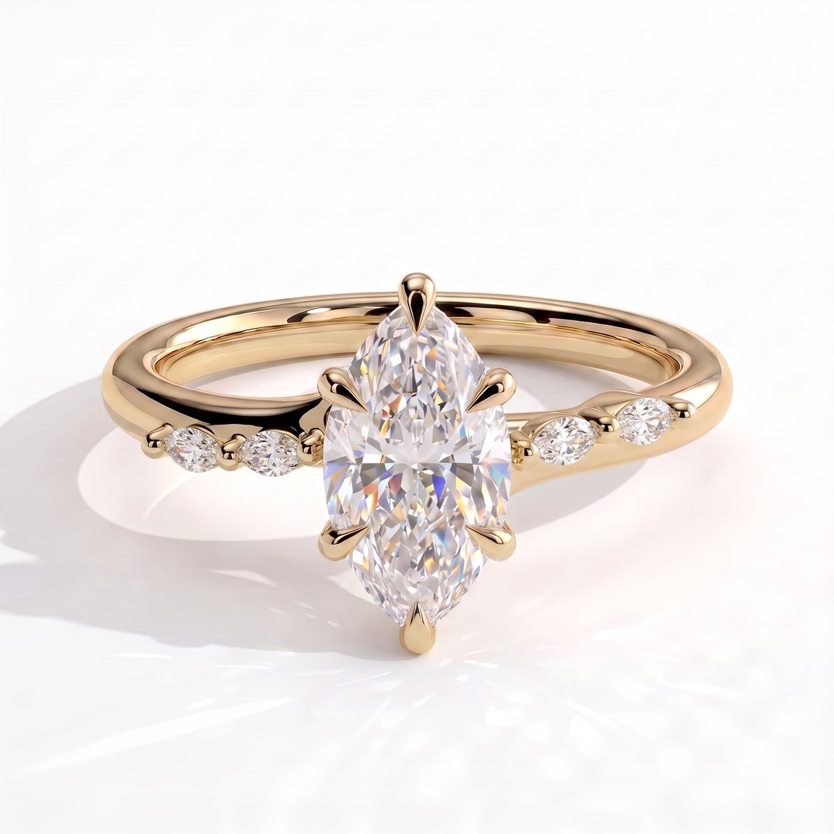 Marquise lab-grown diamond halo engagement ring in 14K (585) yellow gold, front view 