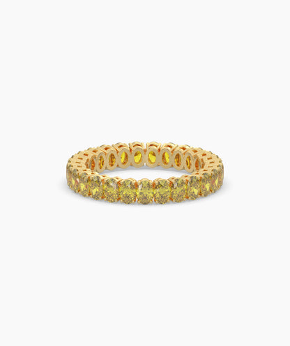 Nina round yellow gemstone eternity ring in 750 yellow gold, front view 