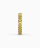 Nina round yellow gemstone eternity ring in 585 yellow gold, side profile view 