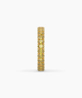 Nina round yellow gemstone eternity ring in 750 yellow gold, side profile view 
