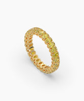 Nina round yellow gemstone eternity ring in 585 yellow gold, angled view 