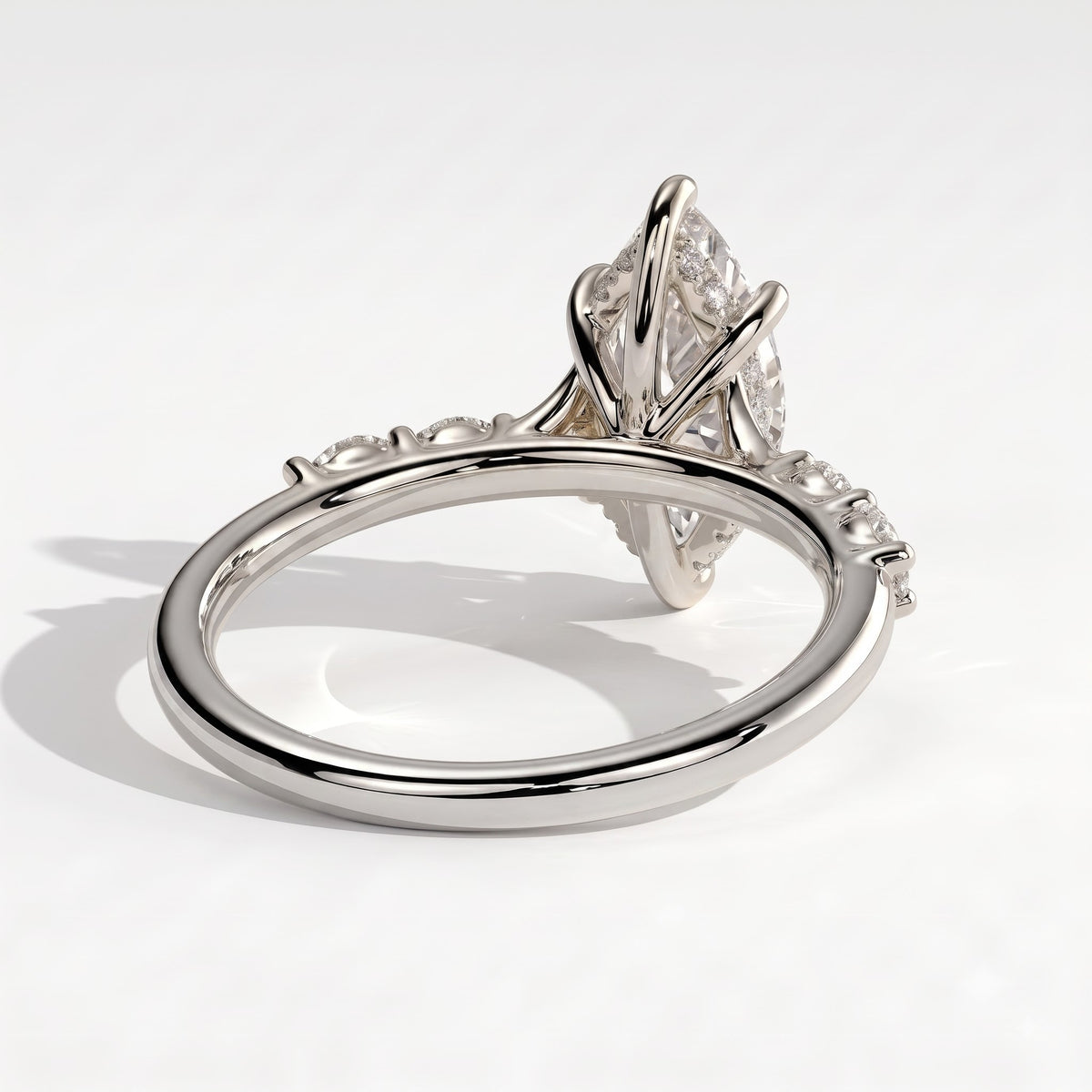 Marquise lab-grown diamond halo engagement ring in 950 platinum, on white background 