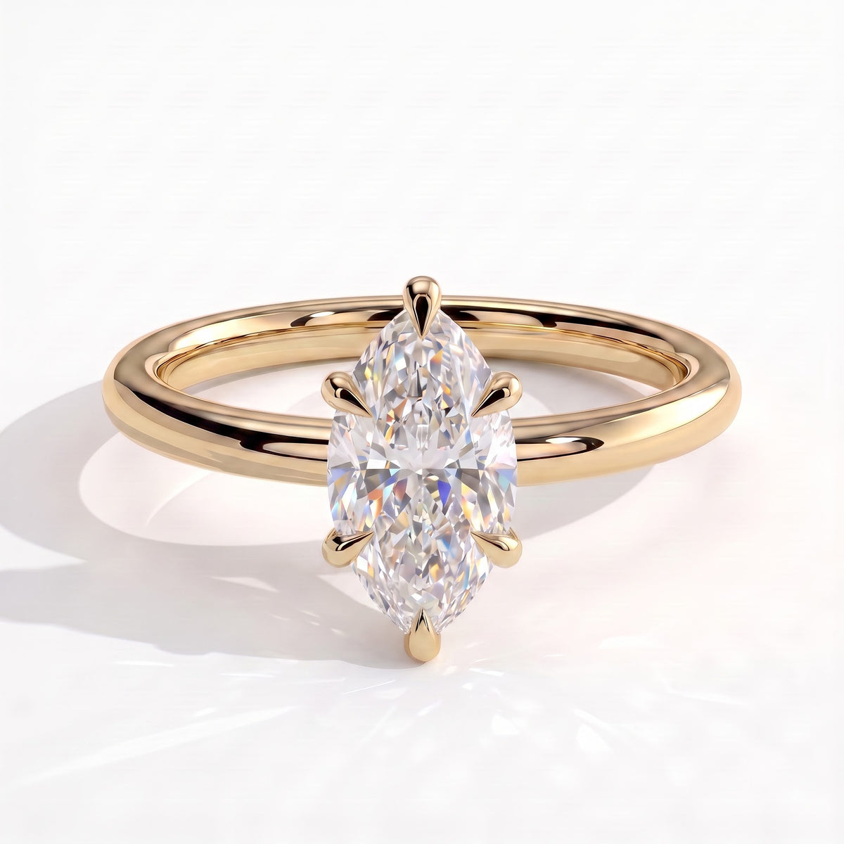 Marquise lab-grown diamond solitaire engagement ring in 18K (750) yellow gold, front view 