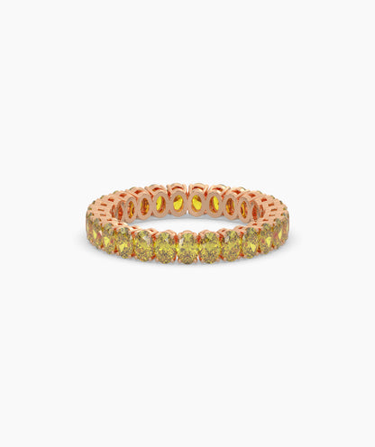 Nina round yellow gemstone eternity ring in 585 rose gold, front view 