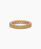 Nina round yellow gemstone eternity ring in 750 rose gold, front view 
