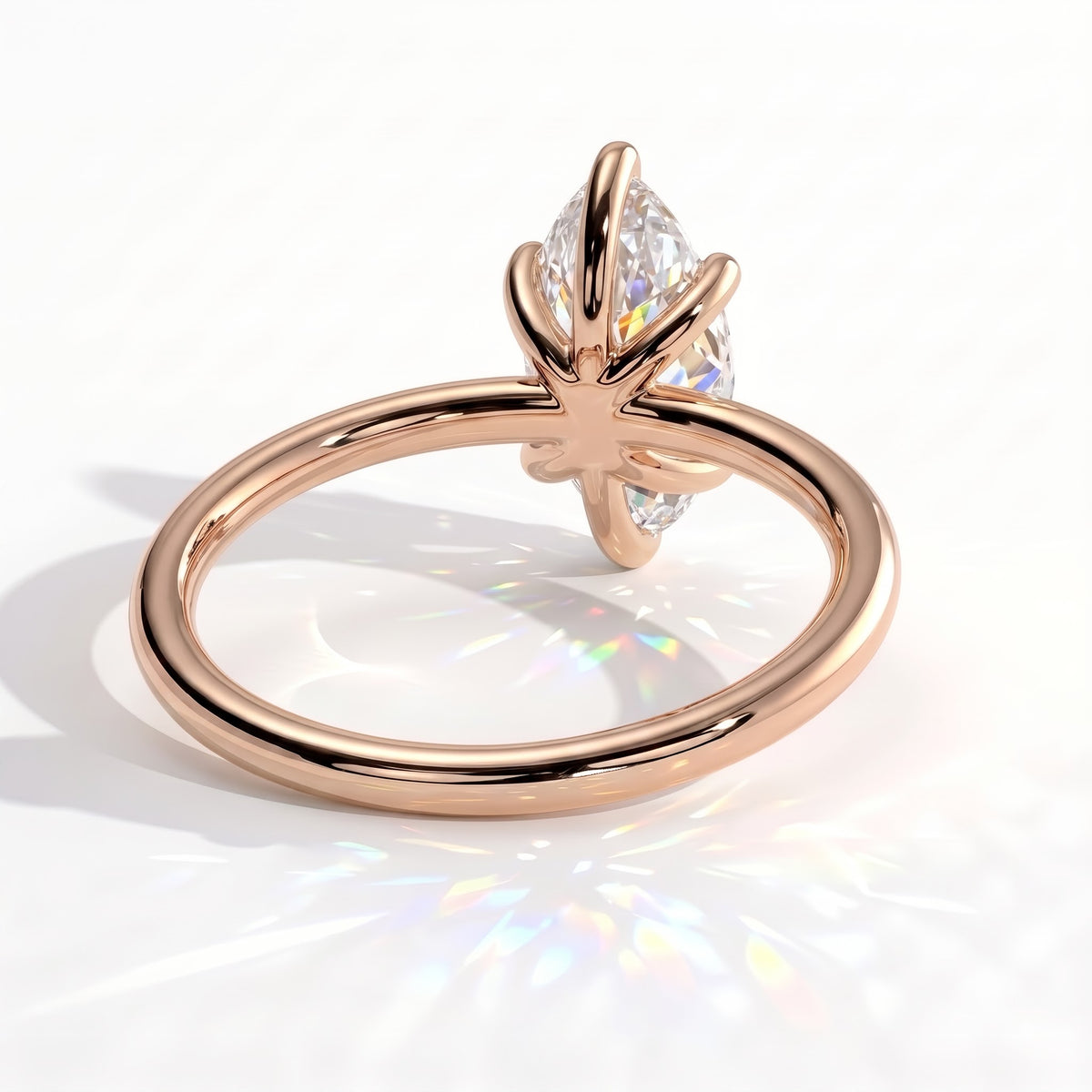 Marquise lab-grown diamond solitaire engagement ring in 18K (750) rose gold, on white background 