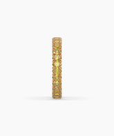 Nina round yellow gemstone eternity ring in 585 rose gold, side profile view 