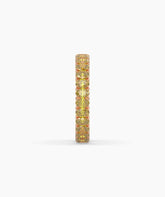 Nina round yellow gemstone eternity ring in 750 rose gold, side profile view 