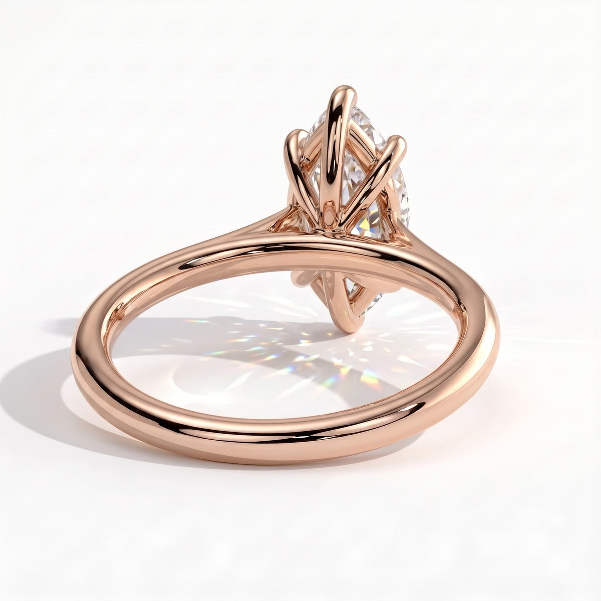 Marquise lab-grown diamond solitaire engagement ring in 14K (585) rose gold, on white background 
