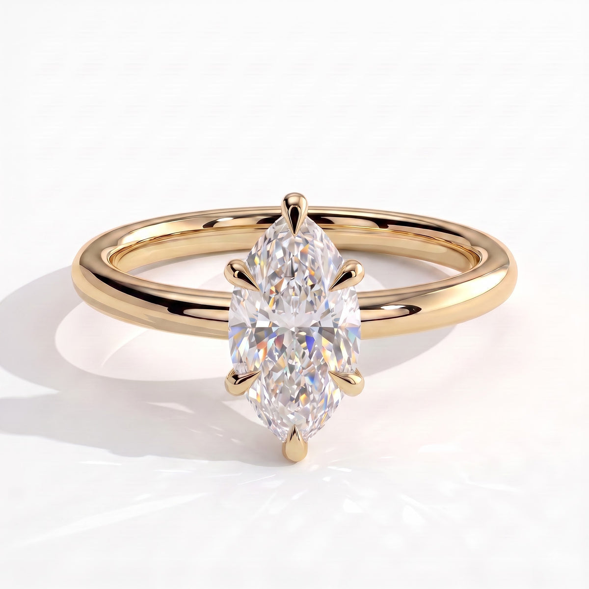 Marquise lab-grown diamond solitaire engagement ring in 14K (585) yellow gold, front view 