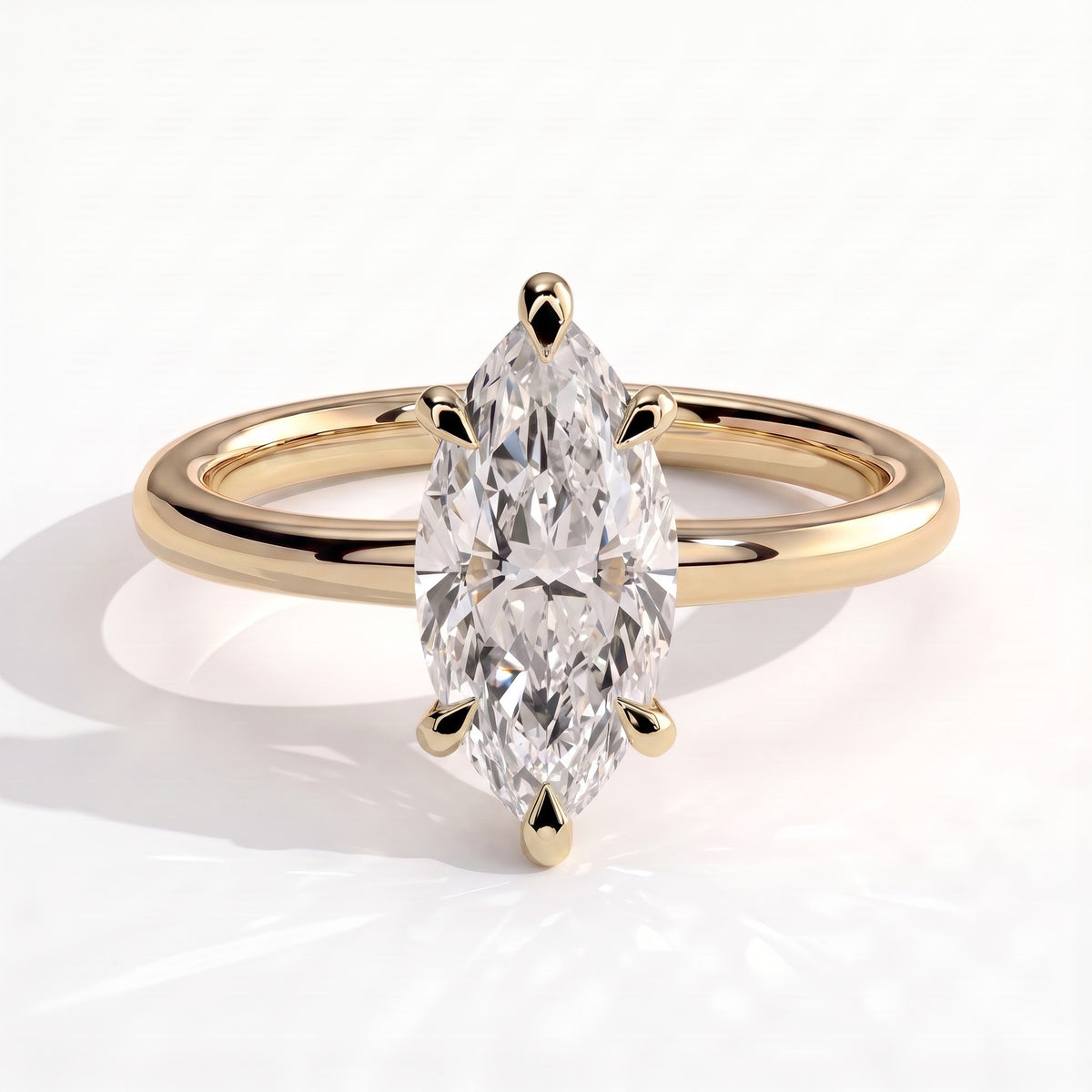 Marquise lab-grown diamond solitaire engagement ring in 18K (750) yellow gold, front view 