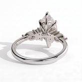 Marquise lab-grown diamond halo engagement ring in 18K (750) white gold, on white background 
