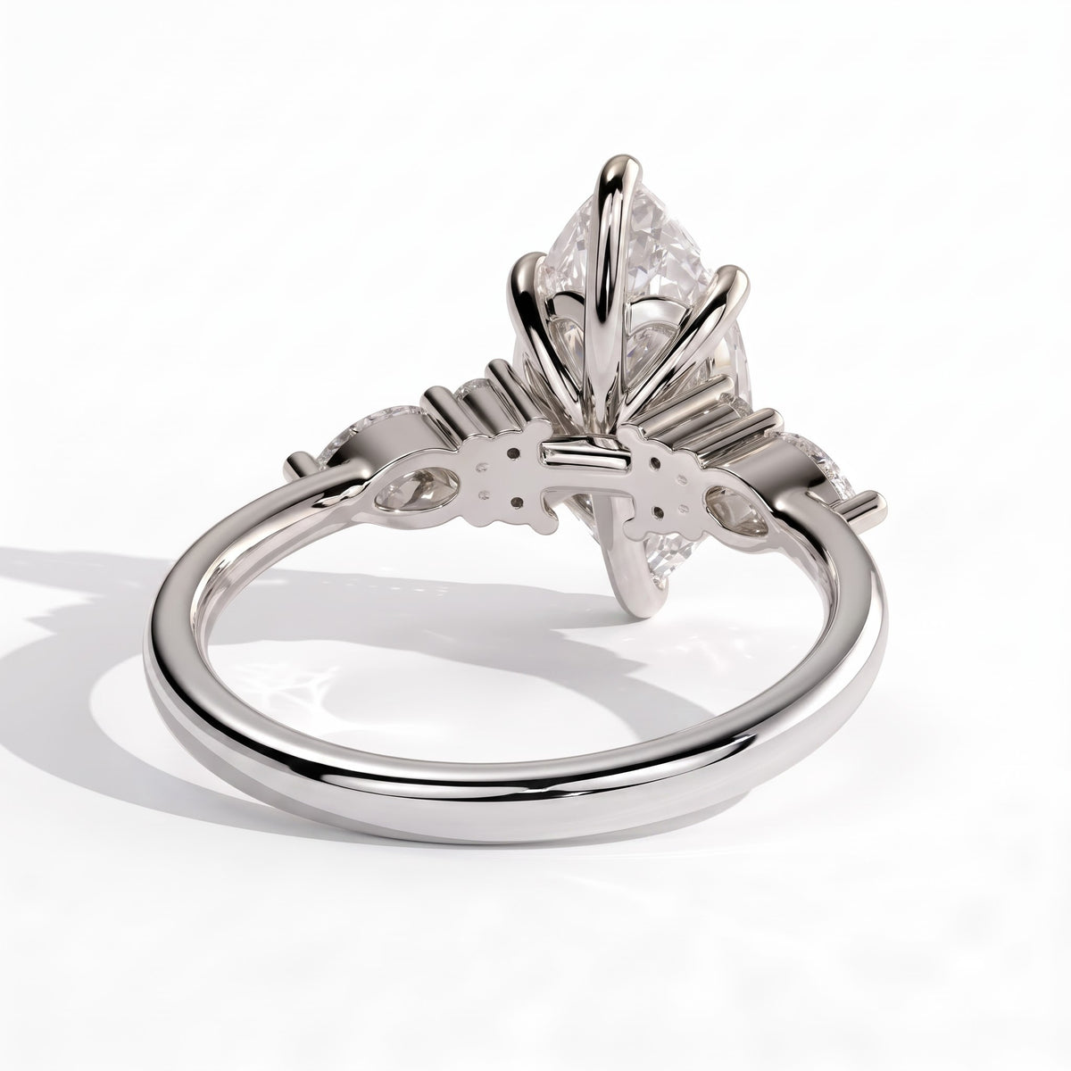 Marquise lab-grown diamond halo engagement ring in 18K (750) white gold, on white background 