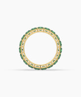 Amira emerald-cut green gemstone eternity ring in 585 yellow gold, top view 