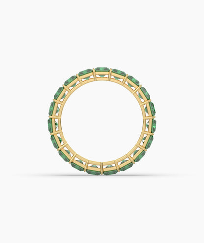 Amira emerald-cut green gemstone eternity ring in 585 yellow gold, top view 