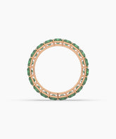 Amira emerald-cut green gemstone eternity ring in 585 rose gold, top view 