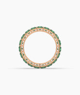 Amira emerald-cut green gemstone eternity ring in 750 rose gold, top view 