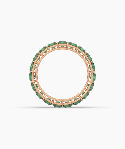 Amira emerald-cut green gemstone eternity ring in 750 rose gold, top view 