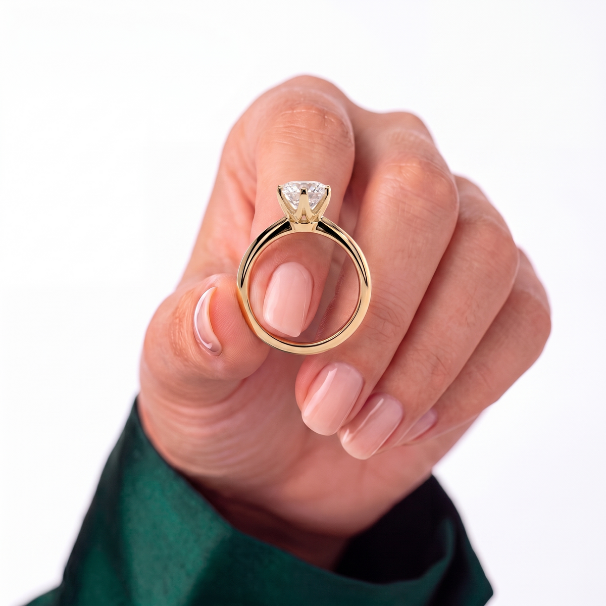 Round lab-grown diamond halo engagement ring in 18K (750) white gold, studio view 