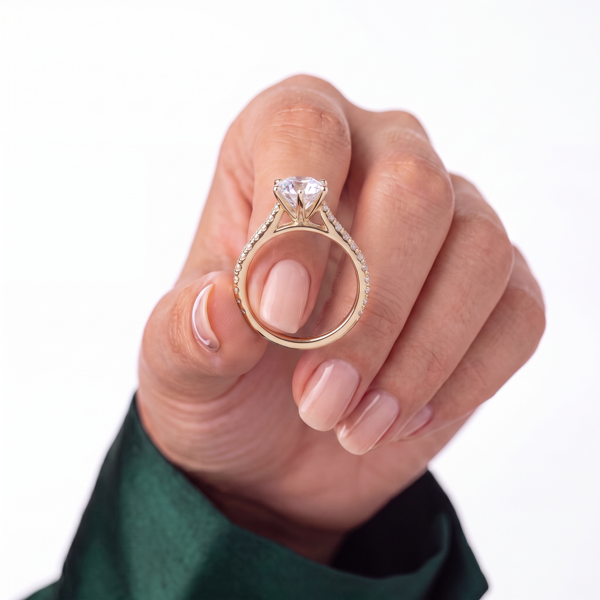 Round lab-grown diamond halo engagement ring in 14K (585) yellow gold, studio view 