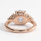 Round lab-grown diamond halo engagement ring in 14K (585) rose gold, on white background 
