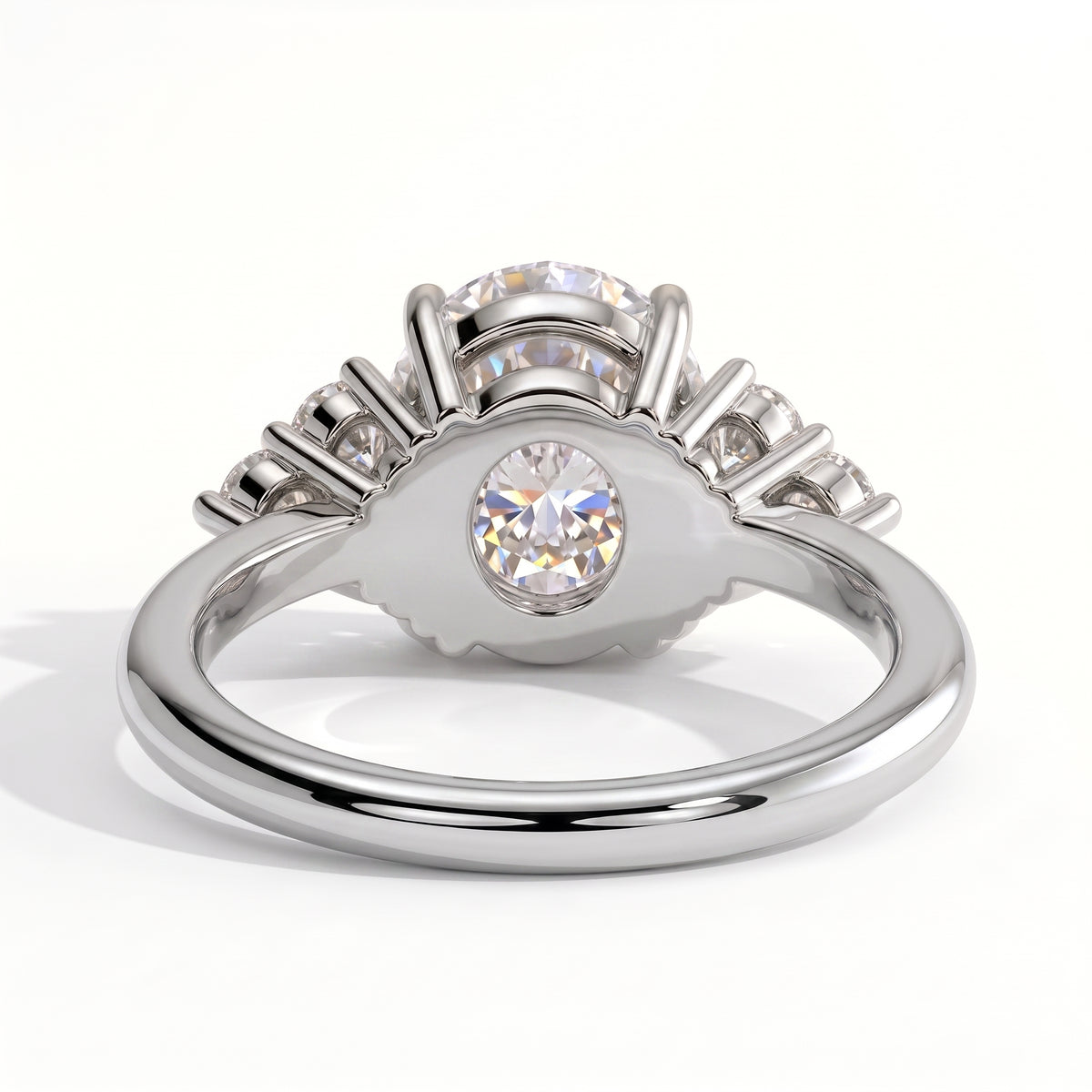Round lab-grown diamond halo engagement ring in 18K (750) white gold, on white background 
