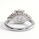 Round lab-grown diamond halo engagement ring in 18K (750) white gold, on white background 