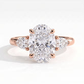 Oval lab-grown diamond three-stone engagement ring in 14K (585) rose gold, front view 