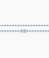 Isola Tennisarmband mit blauen und weißen runden Labordiamanten aus 585 Weißgold, flach liegend, ganze Länge 
