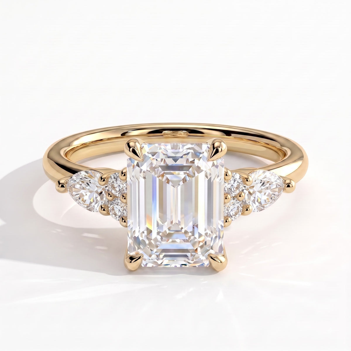 Emerald lab-grown diamond halo engagement ring in 14K (585) yellow gold, front view 