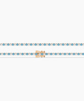 Isola Tennisarmband mit blauen und weißen runden Labordiamanten aus 585 Roségold, flach liegend, ganze Länge 