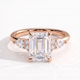Emerald lab-grown diamond halo engagement ring in 14K (585) rose gold, front view 