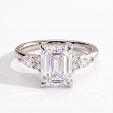 Emerald lab-grown diamond halo engagement ring in 18K (750) white gold, front view 