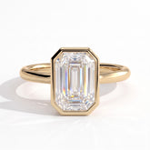Emerald lab-grown diamond bezel-set solitaire engagement ring in 18K (750) yellow gold, front view 