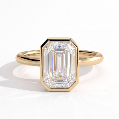 Emerald lab-grown diamond bezel-set solitaire engagement ring in 18K (750) yellow gold, front view 